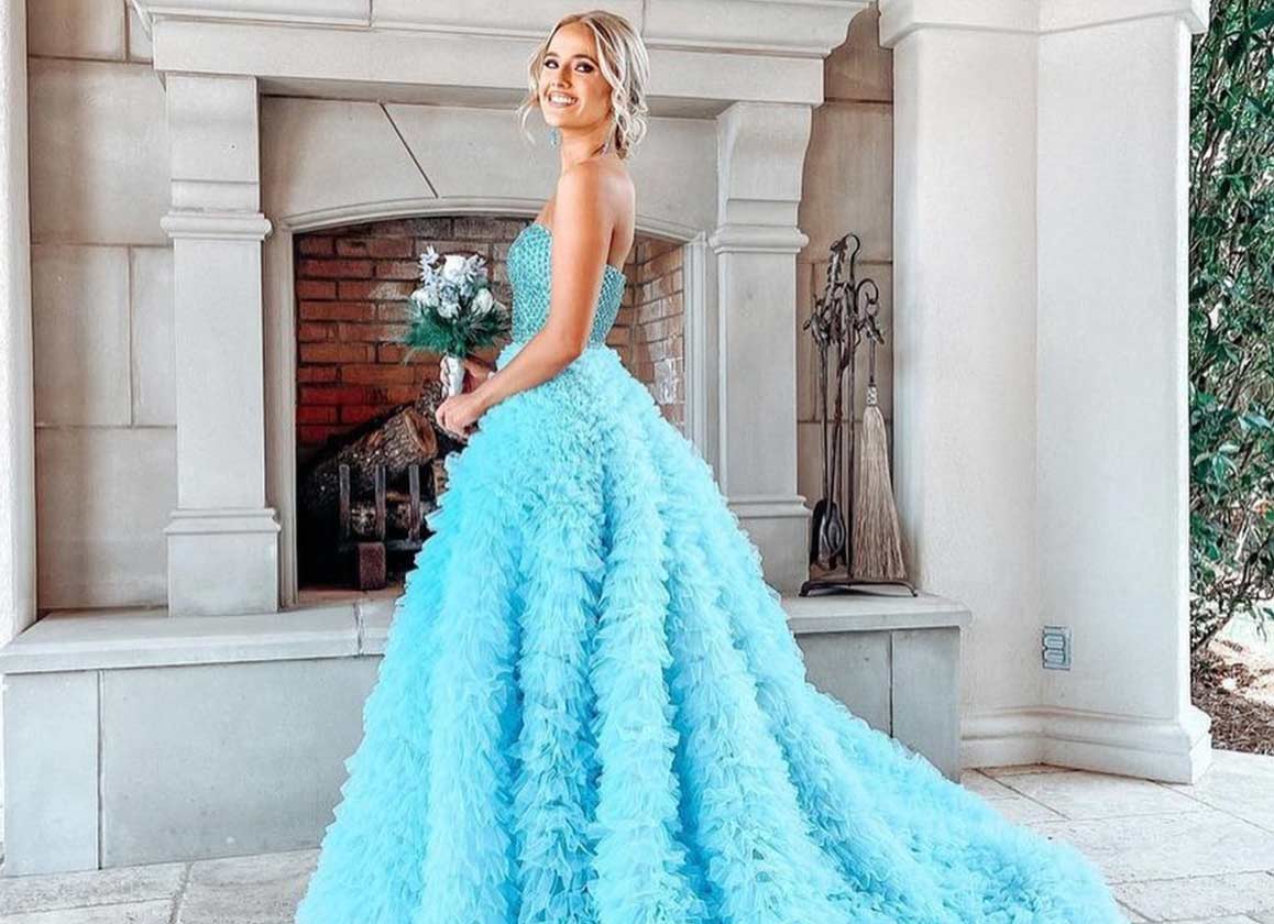 Model wearing a blue gown