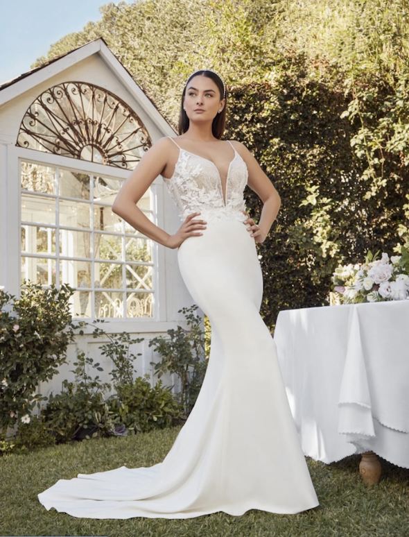 Model wearing a white gown